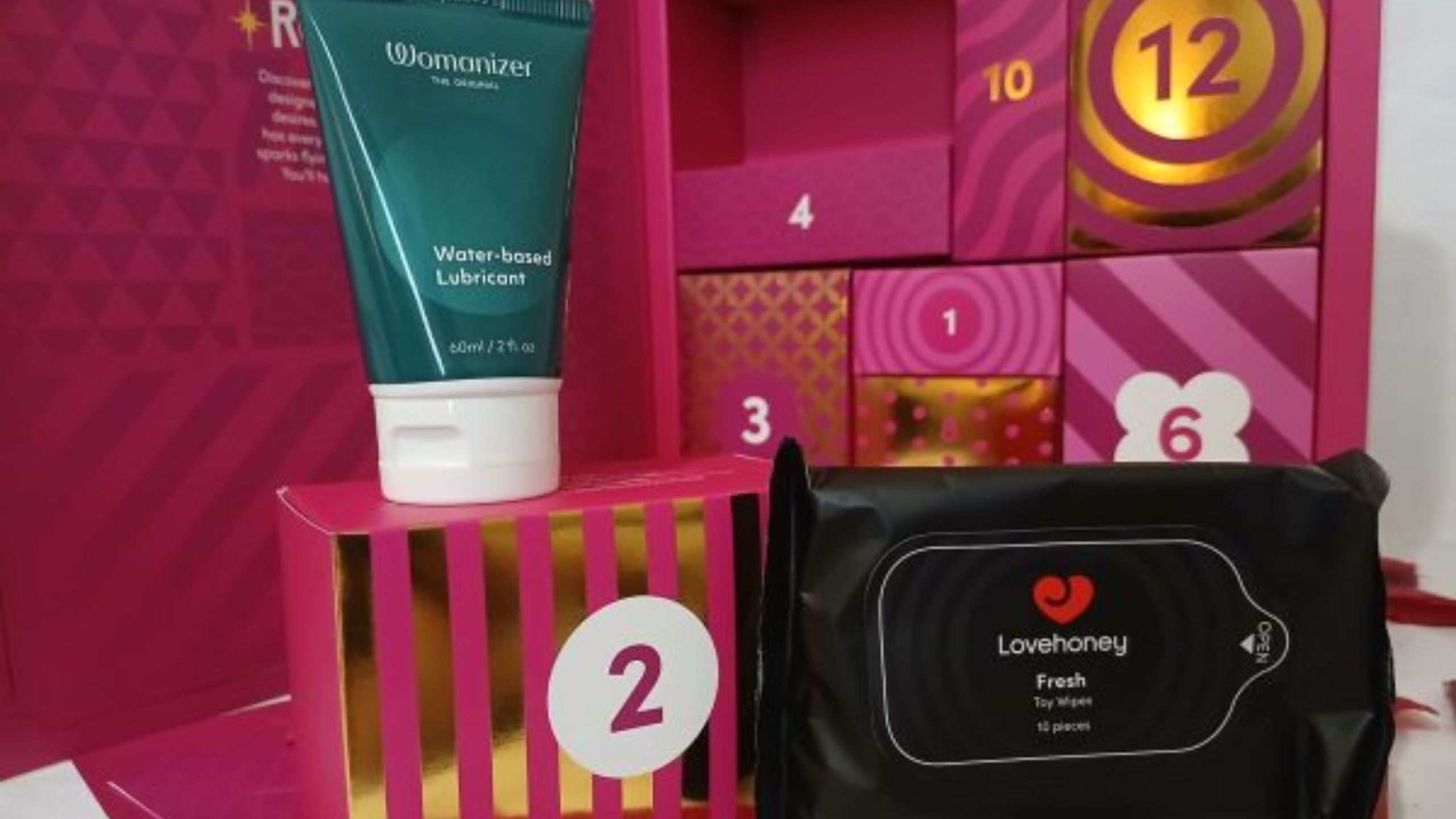 Lovehoney romance advent calendar day 2 Womaniser lubricant and Lovehoney fresh wipes